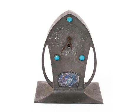 An Art Nouveau  Bitter & Gobbers pewter mantel clock, swollen square section on flaring base, with pointed top, the circular 