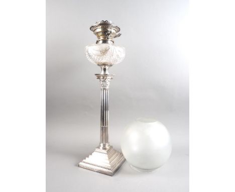 A silver plated Corinthian column oil lamp with globe shade, 21" high Condition:  Base inscribed on all sides.  No cracks or 