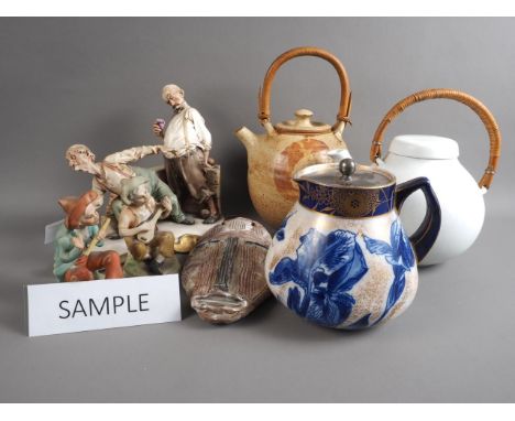 A Capodimonte figure group, old men playing boules, two similar figures, a Doulton hot water jug, three pieces of studio ware