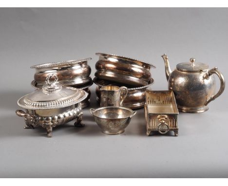 A silver plated three-piece tea service, a plated sauce tureen and cover, four plated coasters, and an "After Eight" mint sta