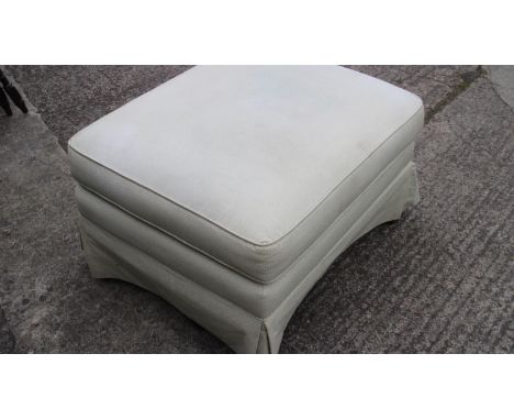 An ottoman, upholstered in a light green linen, on square taper supports, 26" wide x 31" deep x 19" high 