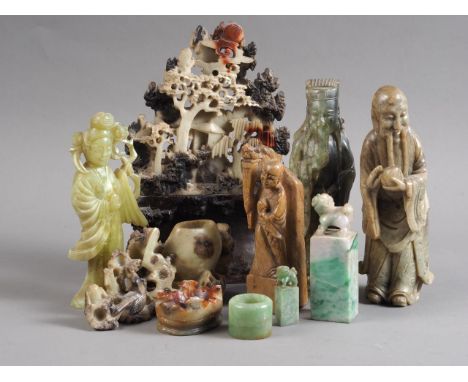 A Chinese carved soapstone table, landscape, 7 1/2" high, three similar figures, a brush washer and other carved stoneConditi