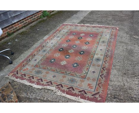 A modern Gabbeh rug of Kazak design, on a light ground, 92" x 63" approx 