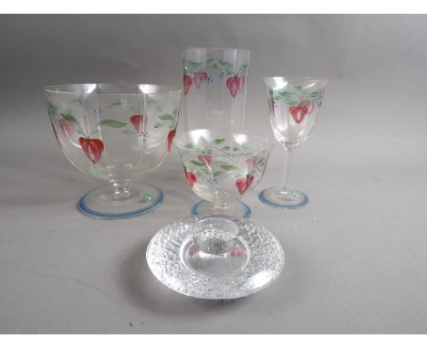 An Orrefors enamel glass vase, 8 1/2" high, two matching bowls, a wine glass and an Orrefors candlestick 