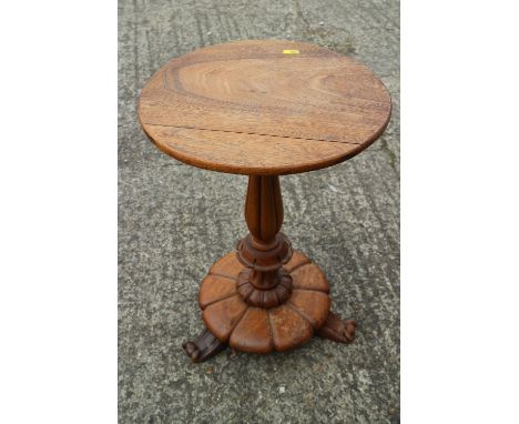 A William IV mahogany circular top occasional table, on turned and carved column, circular base and scroll feet, 13 1/2" dia 