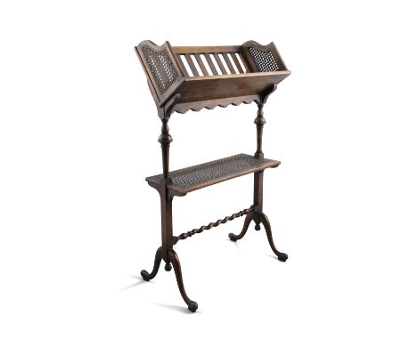 AN UNUSUAL BEECHWOOD AND CANEWORK READING/FOLIO STAND, 19th century, with angled trough, with slatted panel and canework side