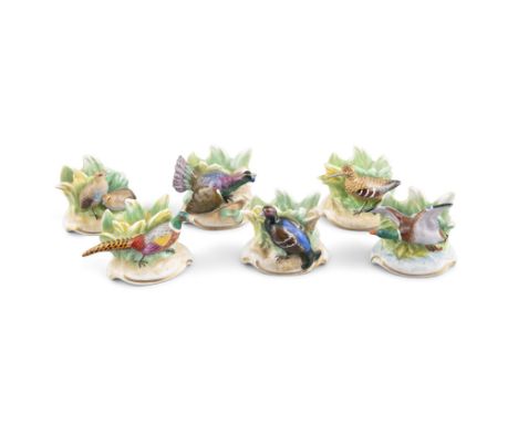 A SET OF SIX PORCELAIN MENU HOLDERS, 20th century, each with a different game bird, each marked 'Dresden' together with a Bes