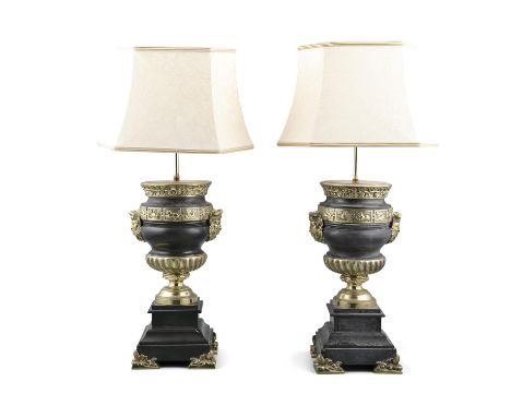 A PAIR OF BRASS MOUNTED BLACK MARBLE URN SHAPED TABLE LAMPS, electrified, of circular form with satyr mask and banding with a