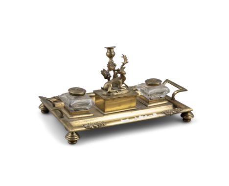 ***PLEASE NOTE THIS LOT SHOULD READ 396 IN THE PRINTED CATALOGUE'***A VICTORIAN BRASS DESK STAND, of rectangular form, with t