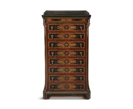 AN FRENCH ORMOLU, WALNUT AND EBON INLAID CHEST, with pierced brass gallery rail above seven drawers, each with blue velvet li