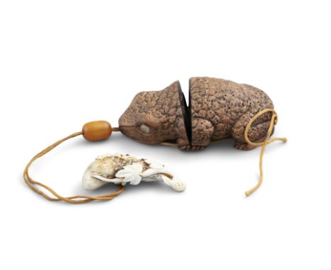 A JAPANESE STAG ANTLER NETSUKE AND INRO,&nbsp; the netsuke formed as a frog on a pond plant, the inro carved as a toad, with 