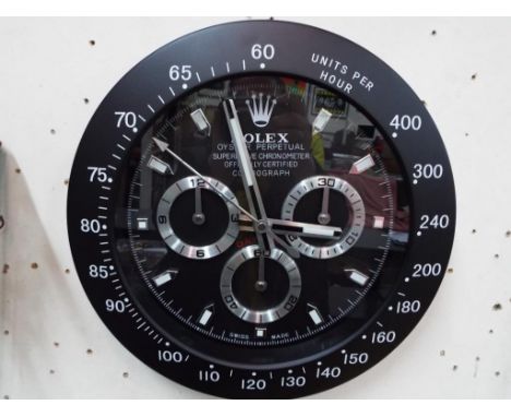 A Dealers wall clock. Estimate £100 - £120