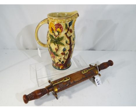A ceramic water jug by H J Wood, Staffordshire pottery, decorated in Indian Tree pattern, approximate height 24 cm and a Asia