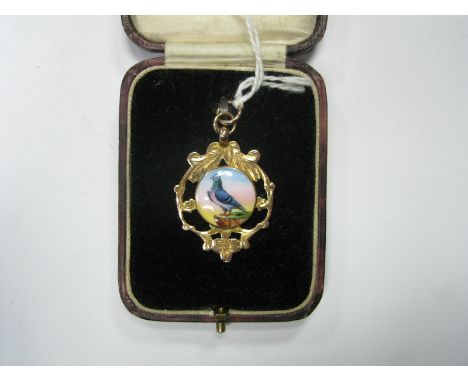 An Openwork Medallion Pendant, highlighted in enamel with a pigeon, inscribed "G.H.S. 1926 Combined Average A. Lambert &amp; 