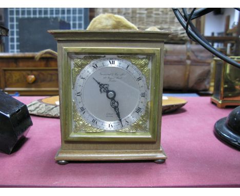 An Elliott Mahogany Cased Mantel Clock, silvered chapter ring, Roman numerals, cast brass spandrels, labelled Garrard &amp; C