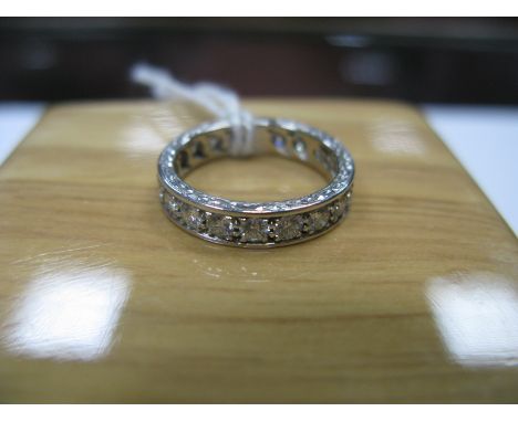 A Modern Diamond Set Eternity Band, set throughout with uniform brilliant cut stones, stamped "1.54", (indistinctly stamped "