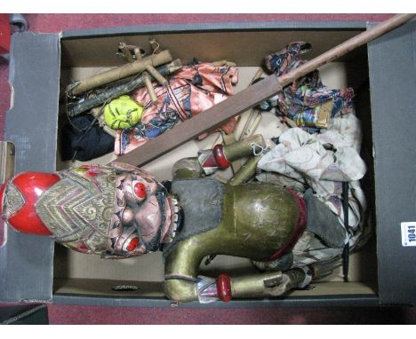 Large Carved Wooden Puppet, with grotesque male head and articulated arms, with original paint work. two others similar.