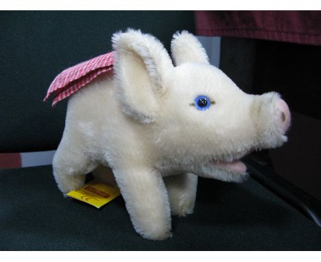 A Modern Steiff Piglet, with blanket, button to ear.