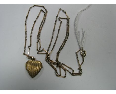 A Long Fancy Link Chain, suspending heart shape locket pendant, allover engine turned.