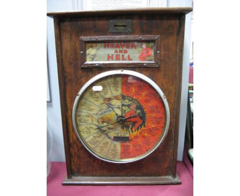 'Heaven and Hell' Slot Machine, the dial in eighteen segments with Good and Bad predicted fortune to each, in stained wooden 