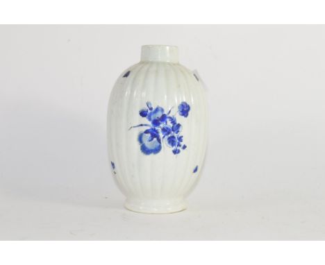 18th century Worcester porcelain tea canister of ribbed form decorated with dry blue flowers, 13cm high