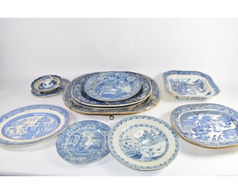 Group of 12 various blue and white platters and plates including a dish in the Gothic ruins pattern, Copeland Italian pattern