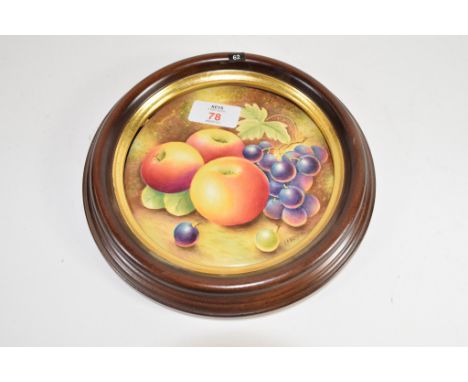 Royal Worcester type circular plaque painted with fruit, bearing signature by Leaman, the plaque 15cm diam