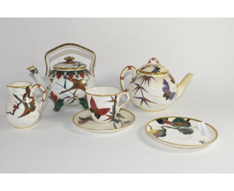 19th century Worcester Japonisme style tea set comprising tea pot with crane and moth decoration, similar milk jug, cup and s