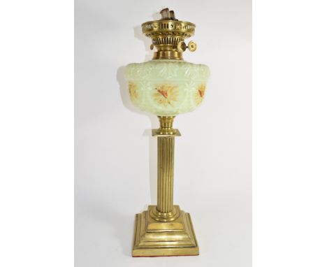 Oil lamp with glass reservoir above a Corinthian column brass base