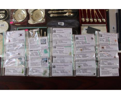Large collection of certificated Gemstones inc. Star Ruby, Peridot etc 