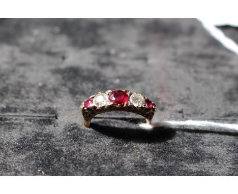 18ct Yellow gold Ladies Diamond and Ruby Set ring of 5 stones. 4.3g total weight. Size O 