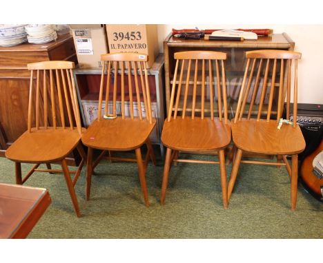 Set of 4 Mid Century Stick back dining chairs on tapering legs 