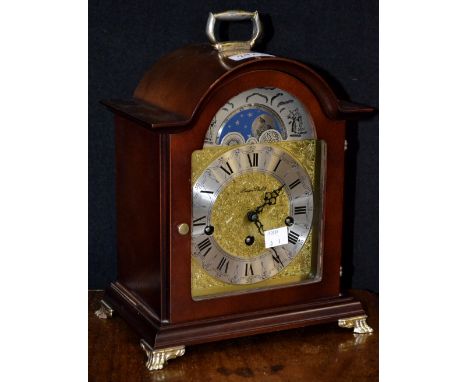 A modern German dome top mantel clock, sun and moon dial, by London Clock, FHS Hermle movement, with key