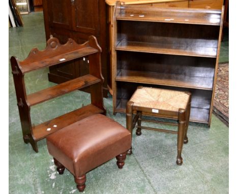 An oak waterfall four tier bookcase; a mahogany wall mounted book shelf; a raffia seated stool; a contemporary  footstool. (4