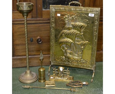 An embossed brass fire screen; a smokers stand; brass letter rack; etc 