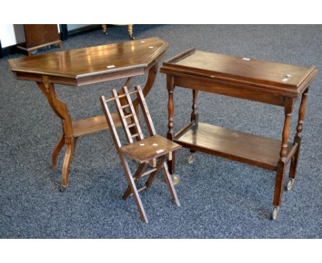 A mahogany demi-octagonal hall table; an oak teat trolley/ card table; a small folding mahogany chair. (3)
