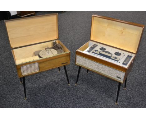 A carousel walnut veneer record player with a monarch BSR twin table, c.1960s; a carousel tape reel-to-reel player similar (2