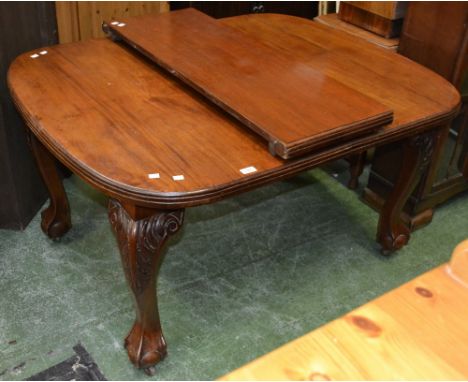 A Victorian mahogany wind out dining table, D-end, cabriole legs, acanthus carved knees, ball and claw feet, ceramic casters.