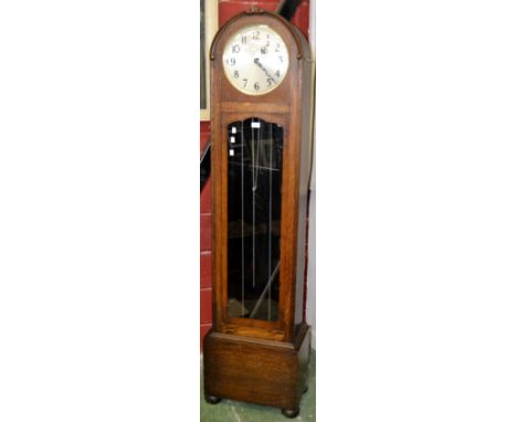 An Art Deco longcase clock, with Westminster chime, chrome weight and pendulum