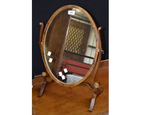 An oval elm dressing mirror 
