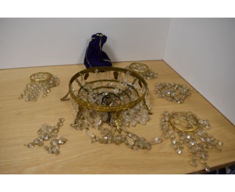 A vintage 20th century gilt metal and clear glass six ring chandelier light fitting sold alongside with four smaller conformi
