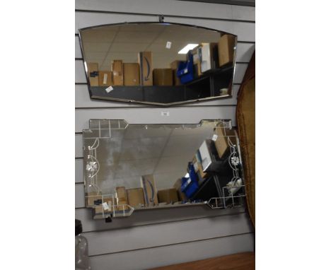 An Art Deco frameless bevelled edge glass mirror, measuring 70cm long, and another frameless mirror with foliate etched borde