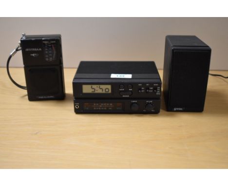 A Ststema 7109B CB radio receiver, a speaker and Jetstream hand held receiver