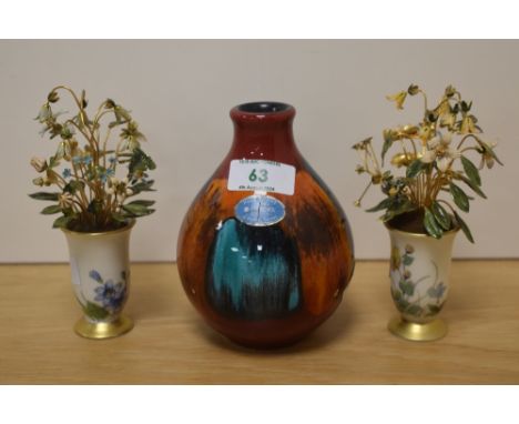 A Poole Pottery Volcano pattern vase, of globular form with short raised neck, applied label to body and moulded mark to base