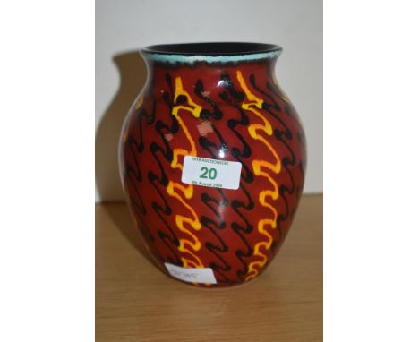 An attractive Poole Pottery 'Strobe' pattern baluster vase, decorated in bands of black and yellow against the red ground, mo