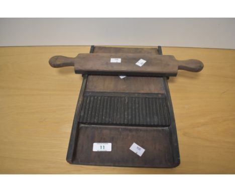 A 19th century brass and mahogany Apothecary pill roller, of traditional design