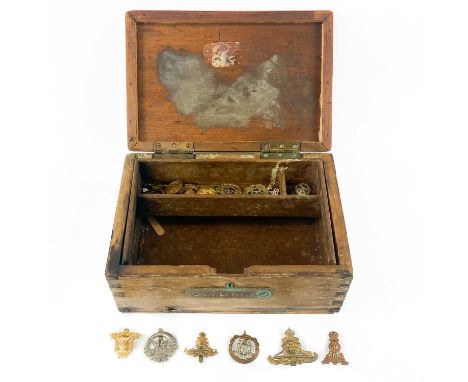 Military Badges A wooden lidded box containing 10 military cap badges in good condition, plus a Women's Land Army Badge, a St