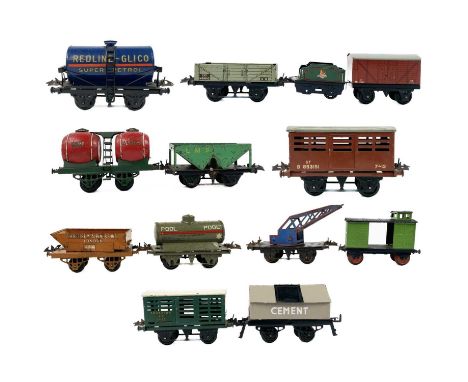 Hornby 0 Gauge Wagons (x13) A wicker basket containing 13 tin plate wagons, noted: a superb Redline Glico Super Petrol wagon,