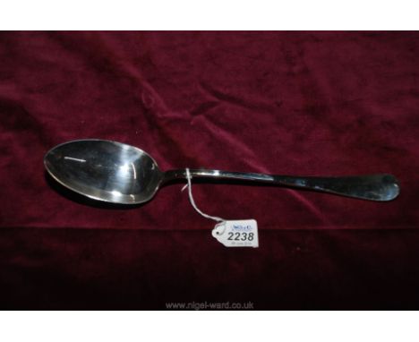 A superb late 19th century E.P. basting spoon 12" long, stamped G.E., little used.