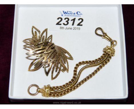 A short triple Watch Chain marked 9ct, 4'' long approx., 6 gms. approx. a 9 ct. pierced work Brooch of abstract design, 5 gms